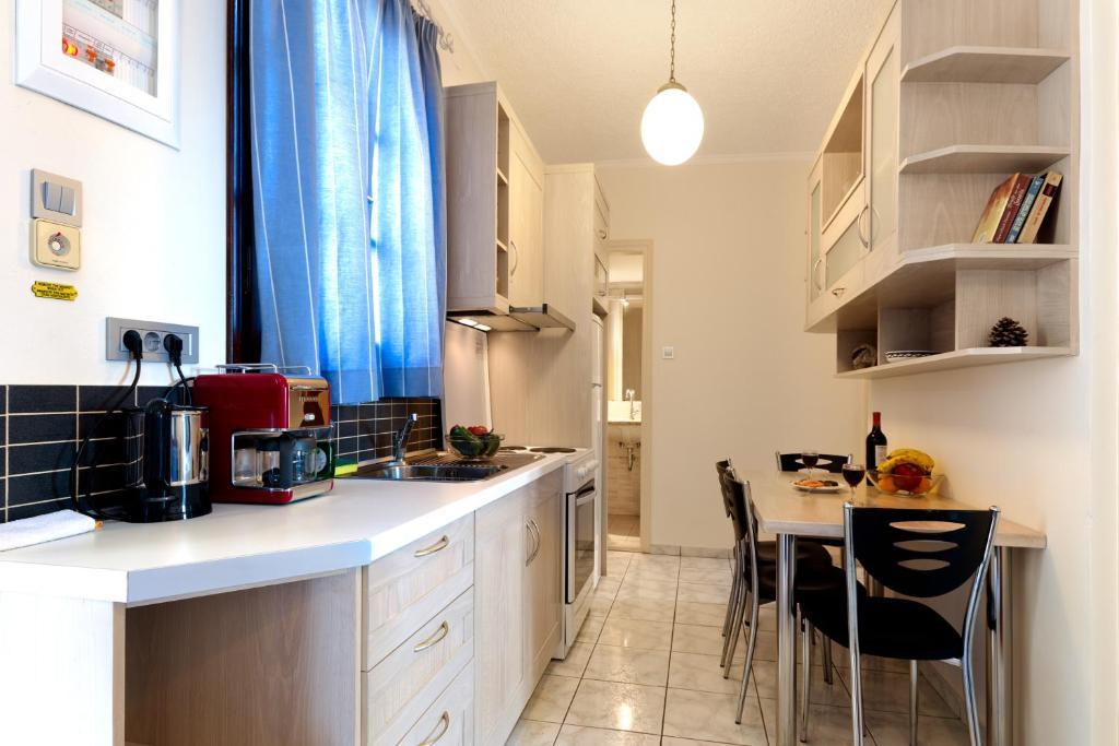 Giorgi'S Blue Apartments Kalathász Szoba fotó